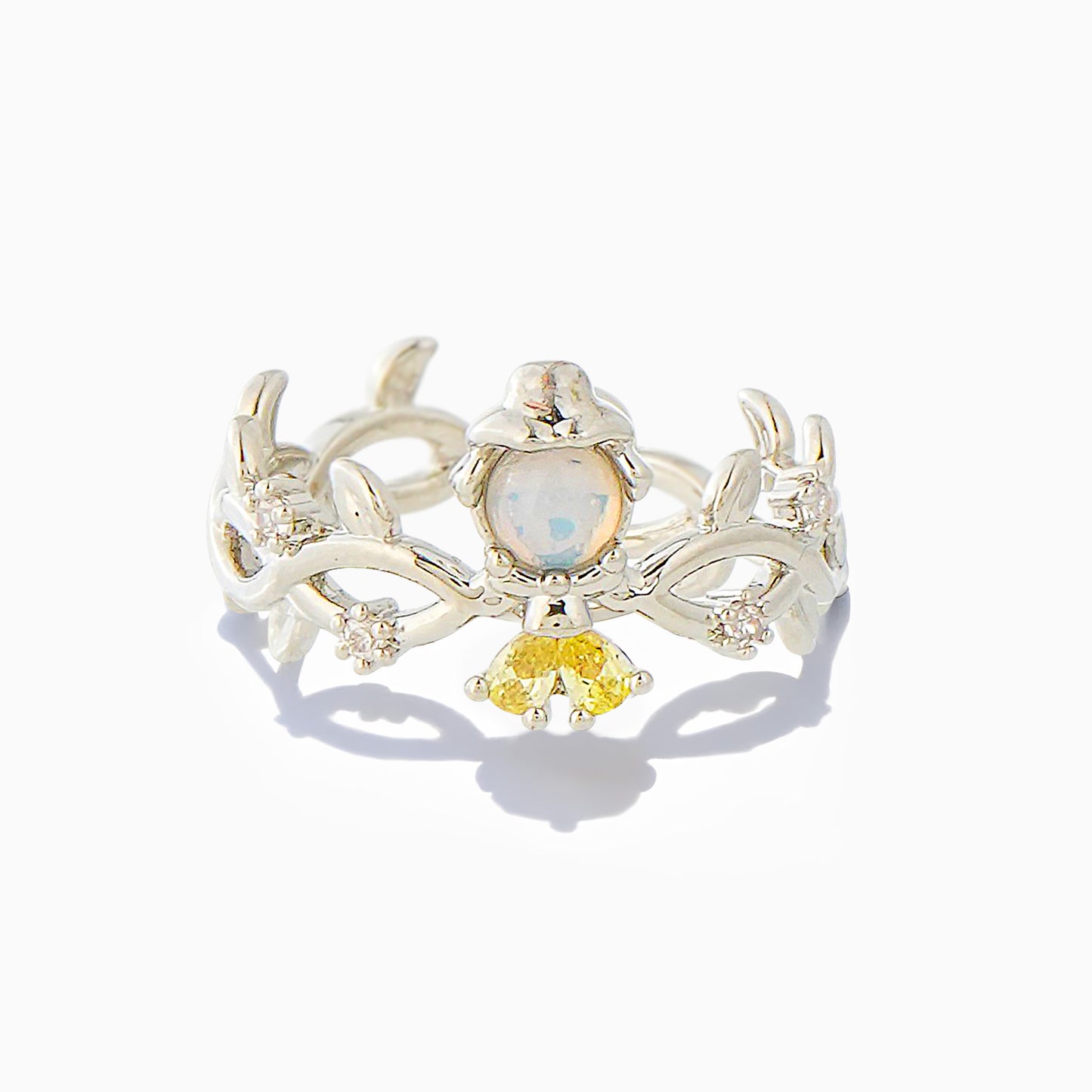 Silver Belle ring with gemstones on a white background