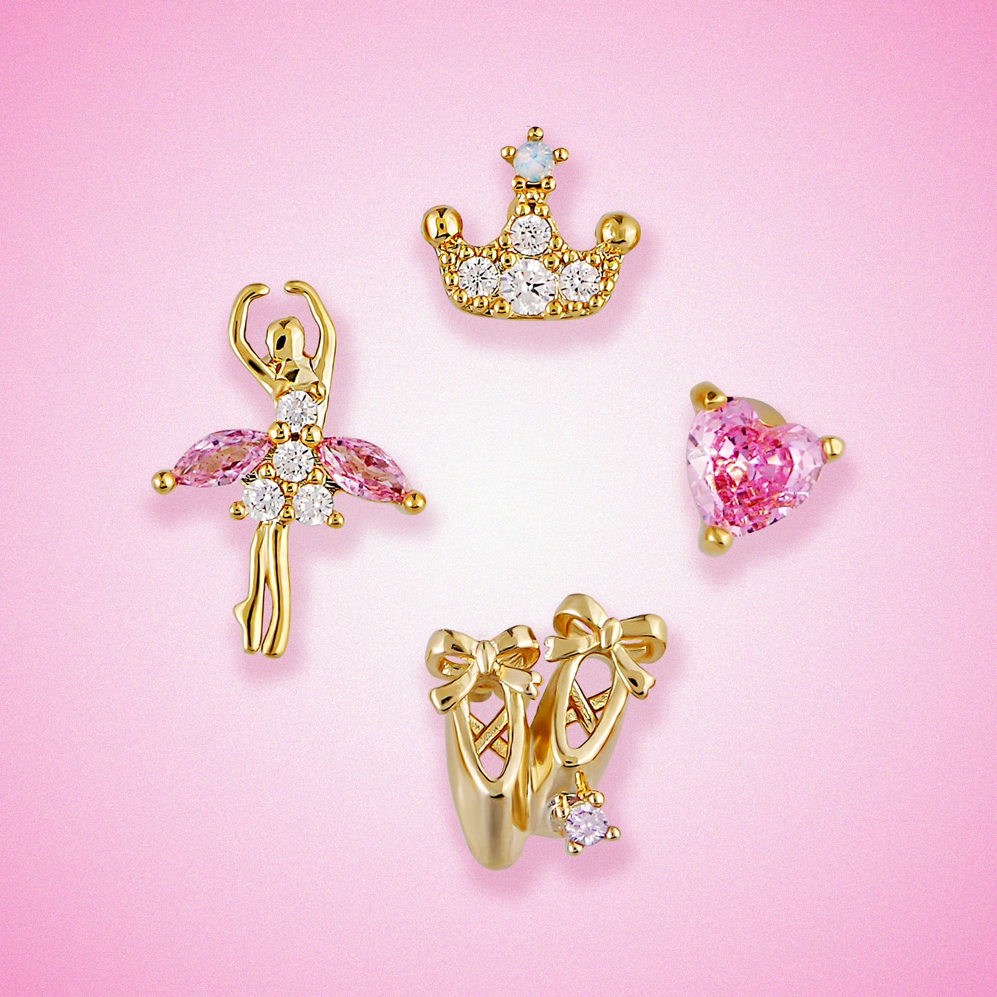 Dancing Princess earring set on a pink background