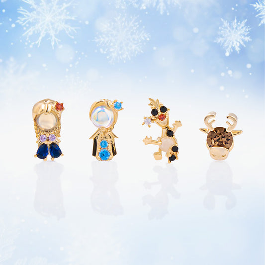 Set of Frozen earrings on a snowy background