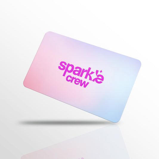 Gift card with 'sparkle crew' text on a light background
