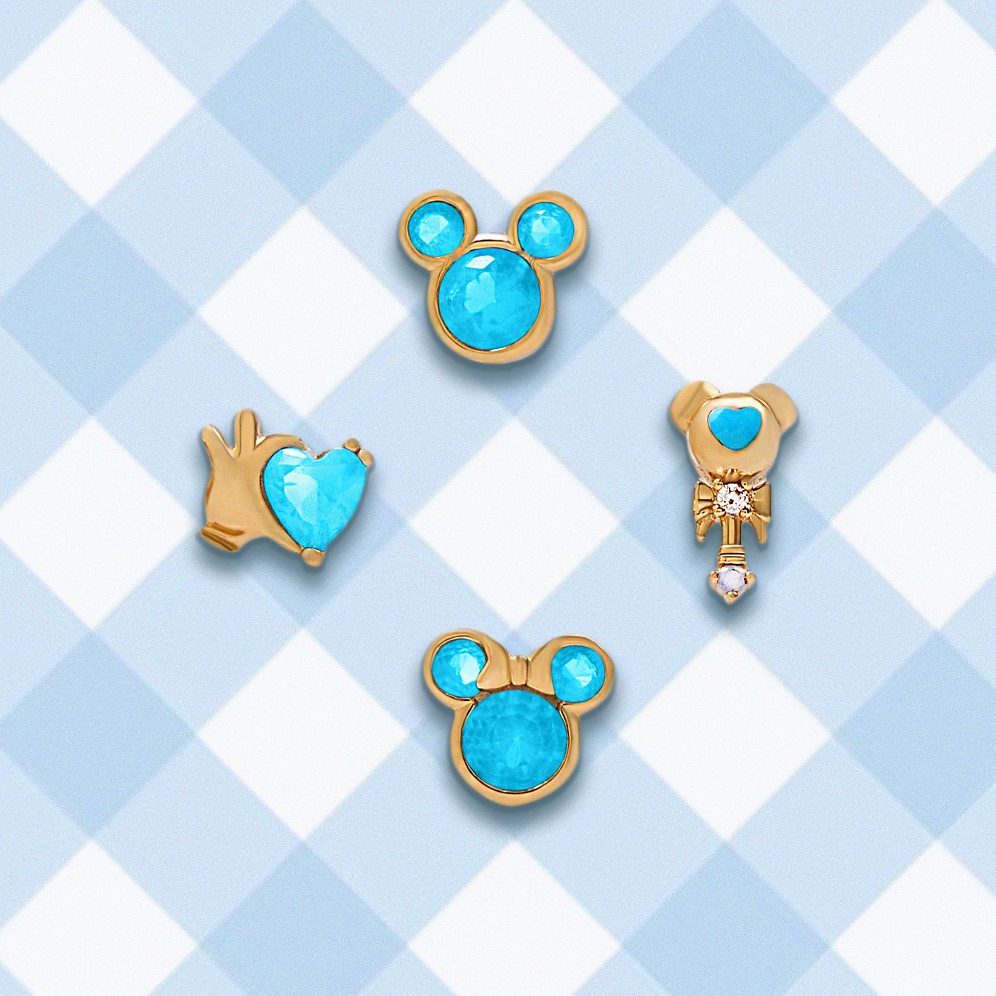 Set of four Mickey & Minnie Blue gold earrings on a light blue checkered background.