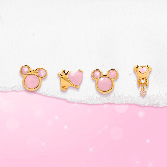 Set of gold Mickey & Minnie pink earrings stubs on a pink and white background