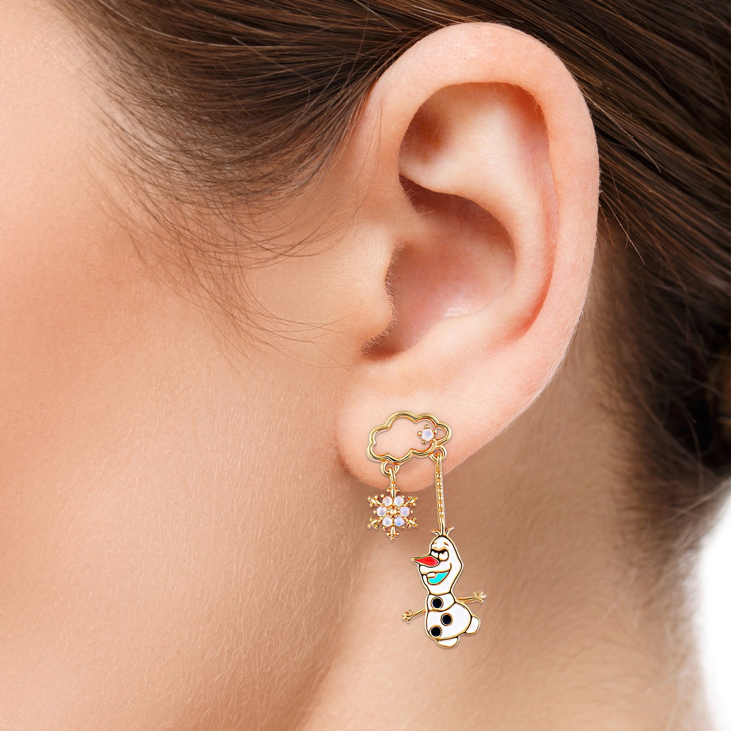 Close up on a ear wearing Olaf dangle earring