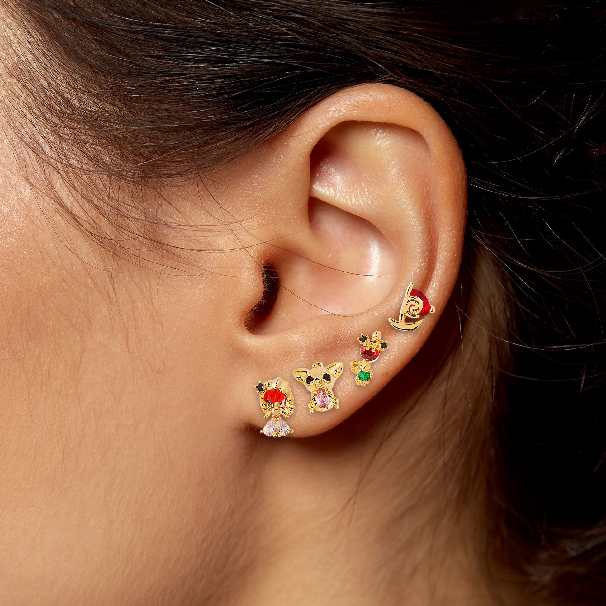 Close-up of an ear wearing Princess Moana Earring Set 